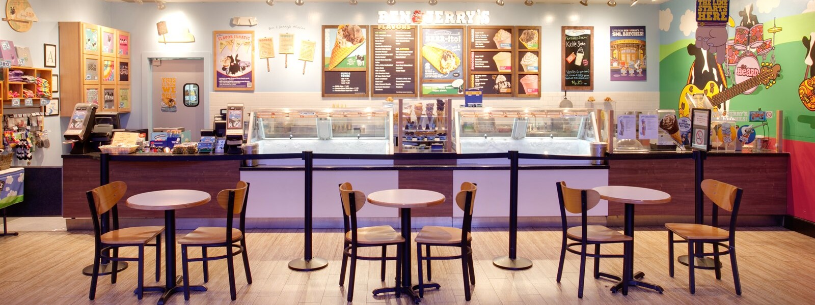 a restaurant with tables and chairs